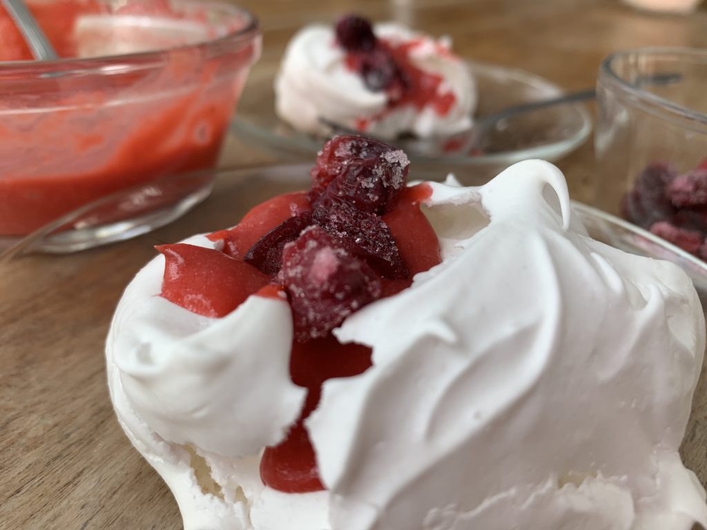 Meringue bird nests with cranberry curd